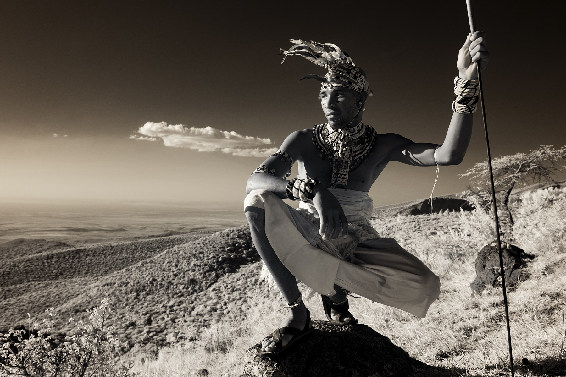 Fine art print of a Rendile warrior over looking the land in Kenya